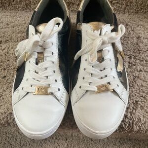 Michael Kors Black, White, and Gold Sneakers